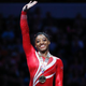 Simone Biles waves to the crowd after placing first in combined score in the women’s finals of the 2015 P&G Gymnastics Championships Aug. 15, 2015, in Indianapolis.
Joe Robbins/Getty Images